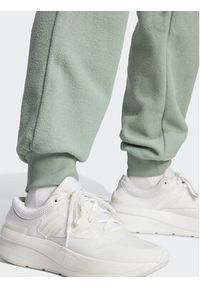 Adidas - adidas Spodnie dresowe IR8372 Zielony Regular Fit. Kolor: zielony. Materiał: syntetyk #3