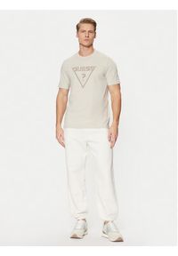 Guess Spodnie dresowe Z4YB00 KAIJ1 Écru Relaxed Fit. Materiał: bawełna