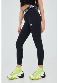 New Balance legginsy treningowe Relentless Crossover damskie kolor czarny z nadrukiem. Kolor: czarny. Materiał: skóra, materiał. Wzór: nadruk