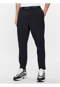 Calvin Klein Performance Spodnie dresowe 00GMS4P643 Czarny Regular Fit. Kolor: czarny. Materiał: syntetyk #1
