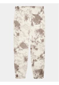 Calvin Klein Jeans Spodnie dresowe IB0IB01602 Beżowy Regular Fit. Kolor: beżowy. Materiał: bawełna