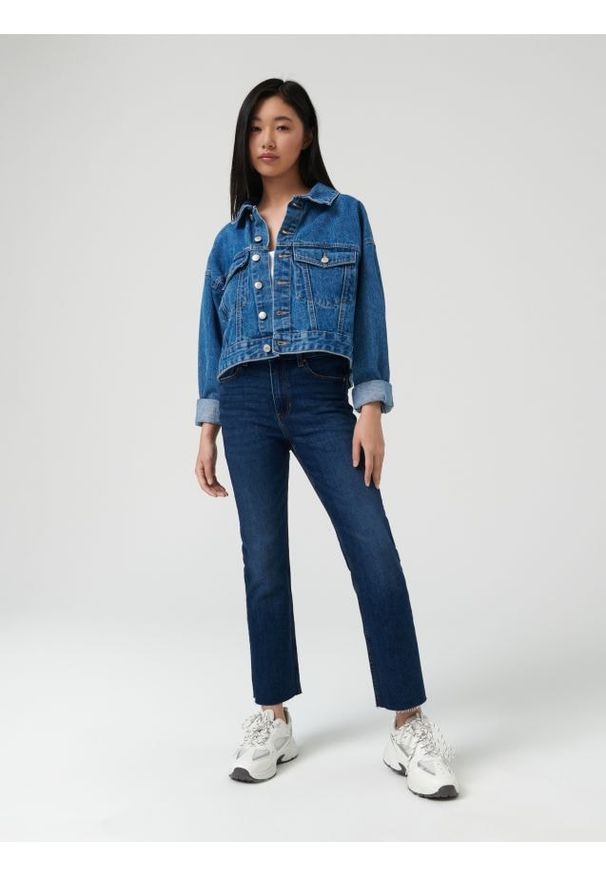 Sinsay - Jeansy slim mid waist - granatowy. Kolor: niebieski