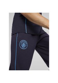 Puma - Męskie spodnie Casuals Manchester City PUMA New Navy Magic Blue. Kolor: niebieski. Materiał: dresówka