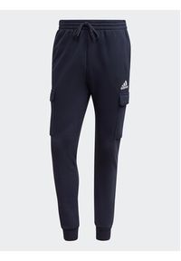 Adidas - adidas Spodnie dresowe Essentials HL2232 Granatowy Regular Fit. Kolor: niebieski. Materiał: bawełna #4