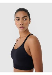 4f - 4F Biustonosz treningowy z niskim wsparciem - czarny XS/S. Kolor: czarny. Materiał: elastan, materiał, włókno, dzianina, jersey, syntetyk. Rodzaj stanika: wyciągane miseczki. Wzór: ze splotem, gładki, jednolity. Sport: fitness, joga i pilates #2