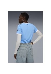 Puma - Damska koszulka domowa Manchester City 25/26 PUMA Team Light Blue White. Kolor: biały, wielokolorowy, niebieski. Wzór: aplikacja, paski