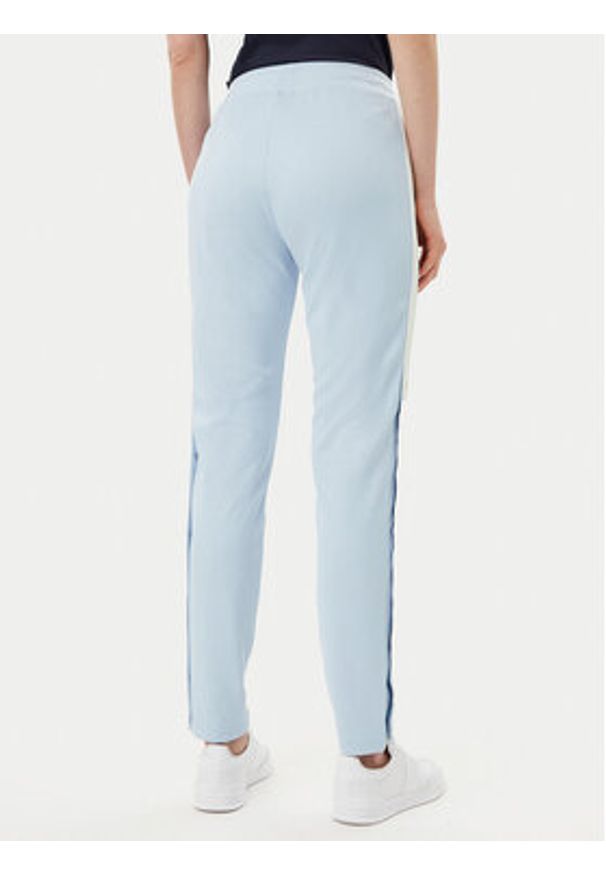 Ellesse Spodnie dresowe Teodoro SGZ21974 Błękitny Slim Fit. Kolor: niebieski. Materiał: syntetyk