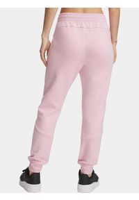 Spodnie sportowe damskie Under Armour Unstoppable FLC. Kolor: różowy. Sport: fitness