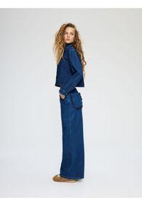 Reserved - Jeansy wide leg z ozdobnymi kieszeniami - niebieski. Kolor: niebieski #1