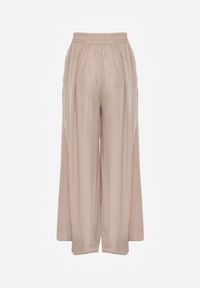 Born2be - Beżowe Szerokie Spodnie z Gumką w Talii Bohdi. Kolor: beżowy. Materiał: wiskoza, tkanina #3