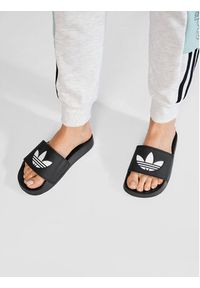 Adidas - adidas Klapki Adilette Lite FU8298 Czarny. Kolor: czarny. Materiał: skóra #6
