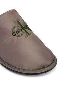 Calvin Klein Kapcie YM0YM01392 Beżowy. Kolor: beżowy. Materiał: materiał #2