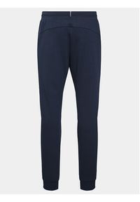 Le Coq Sportif Spodnie dresowe 2310500 Granatowy Slim Fit. Kolor: niebieski. Materiał: bawełna, dresówka