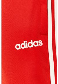 Adidas - adidas - Spodnie. Kolor: czerwony. Materiał: tkanina, poliester. Wzór: aplikacja #2