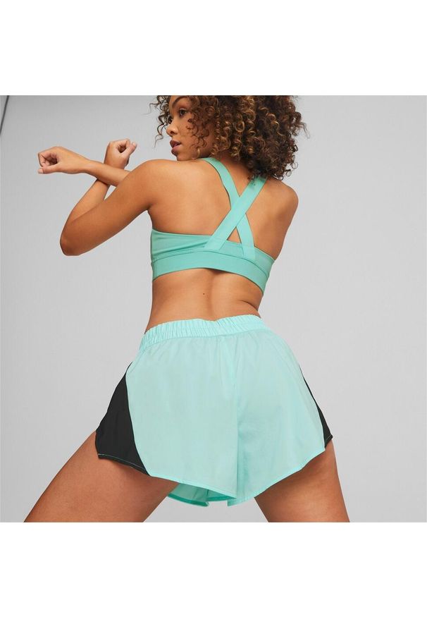 Spodenki Puma Fit Fashion Woven Flow Short, Kobiety. Kolor: niebieski. Materiał: materiał, poliester