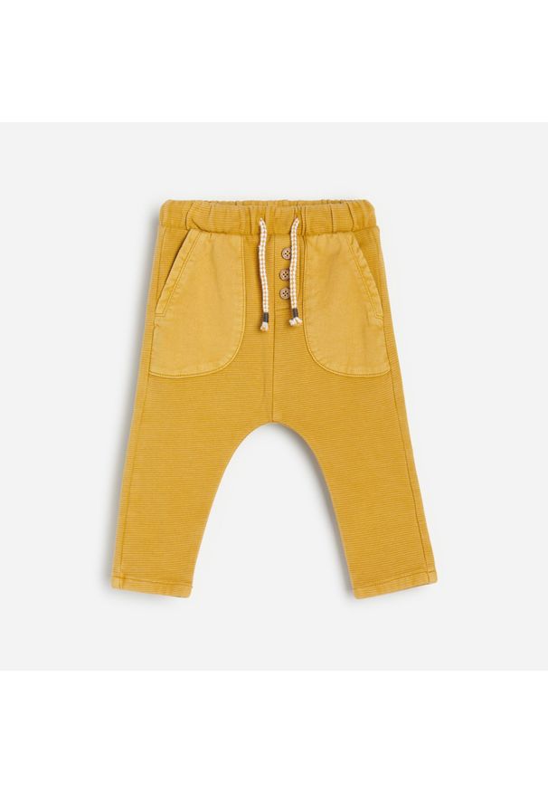 Reserved - Dzianinowe spodnie dresowe - Żółty. Kolor: żółty. Materiał: dzianina, dresówka