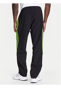 Adidas - adidas Spodnie dresowe Teamgeist adicolor JW5869 Czarny Loose Fit. Kolor: czarny. Materiał: syntetyk #3