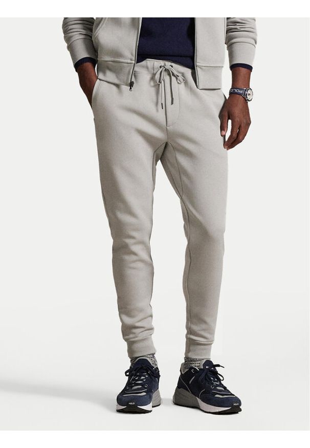 Polo Ralph Lauren Spodnie dresowe 710881518077 Szary jasny Regular Fit. Kolor: szary. Materiał: bawełna