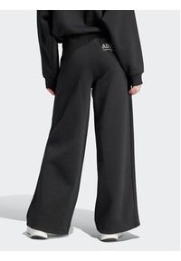 Adidas - adidas Spodnie dresowe IR8377 Czarny Loose Fit. Kolor: czarny. Materiał: bawełna