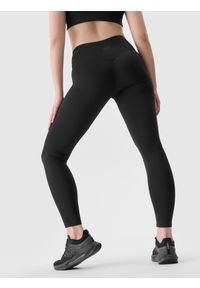 4f - Legginsy treningowe z materiału z recyklingu damskie - czarne. Stan: podwyższony. Kolor: czarny. Materiał: materiał. Wzór: jednolity, ze splotem, gładki. Sport: fitness