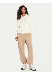 United Colors of Benetton - United Colors Of Benetton Spodnie dresowe 3PKLDF016 Beżowy Relaxed Fit. Kolor: beżowy. Materiał: wiskoza #4
