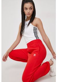adidas Originals Spodnie HF7513 damskie kolor czerwony gładkie. Stan: podwyższony. Kolor: czerwony. Materiał: bawełna, poliester, dzianina. Wzór: gładki #3