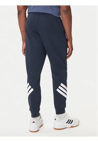 Adidas - adidas Spodnie dresowe Future Icons 3-Stripes JW7088 Granatowy Regular Fit. Kolor: niebieski. Materiał: syntetyk, bawełna