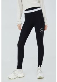 New Balance legginsy WP21800BK damskie kolor czarny z nadrukiem. Kolor: czarny. Materiał: poliester. Wzór: nadruk