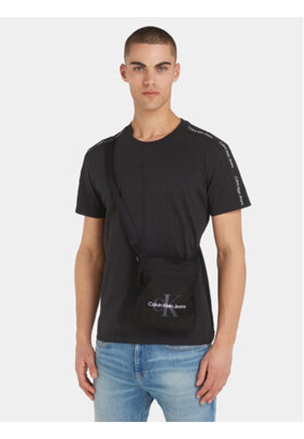 Calvin Klein Jeans Saszetka Sport Essentials Flatpack18 M K50K511097 Czarny. Kolor: czarny. Materiał: materiał, poliester