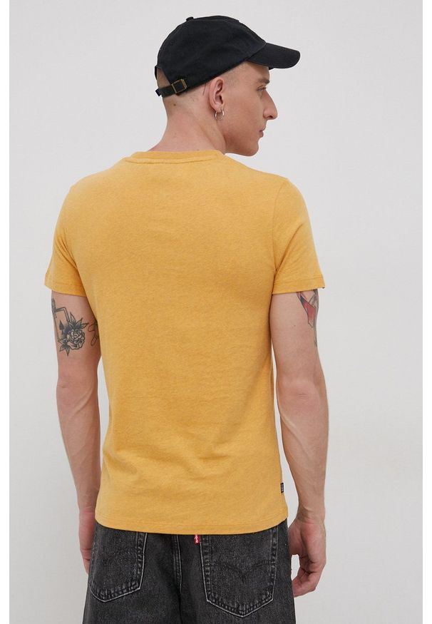 Superdry T-shirt bawełniany kolor żółty gładki. Okazja: na co dzień. Kolor: żółty. Materiał: bawełna. Wzór: gładki. Styl: casual