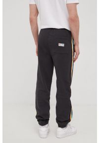 Rip Curl spodnie dresowe męskie kolor czarny z aplikacją. Kolor: czarny. Materiał: dresówka. Wzór: aplikacja #4