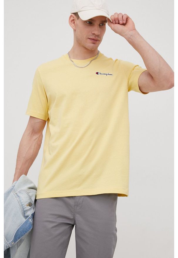 Champion t-shirt bawełniany kolor żółty z aplikacją. Kolor: żółty. Materiał: bawełna. Wzór: aplikacja