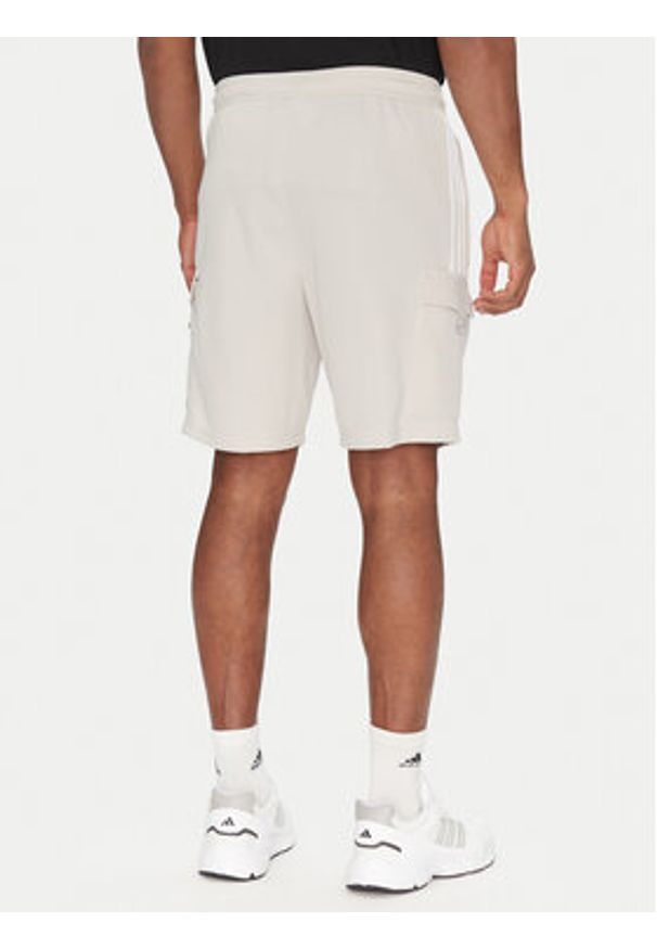 Adidas - adidas Szorty sportowe Tiro Cargo JC7958 Beżowy Regular Fit. Kolor: beżowy. Materiał: syntetyk. Styl: sportowy