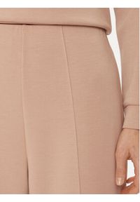 United Colors of Benetton - United Colors Of Benetton Spodnie dzianinowe 3UNN3F03B Beżowy Relaxed Fit. Kolor: beżowy. Materiał: syntetyk #4