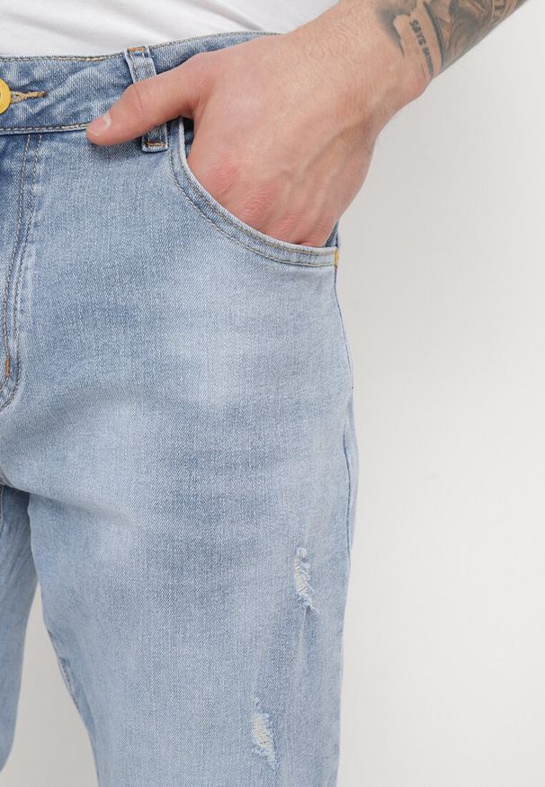 Born2be - Niebieskie Jeansy Skinny z Przetarciami i Wsuwanymi Kieszeniami Faroria. Okazja: na co dzień. Kolor: niebieski. Styl: casual