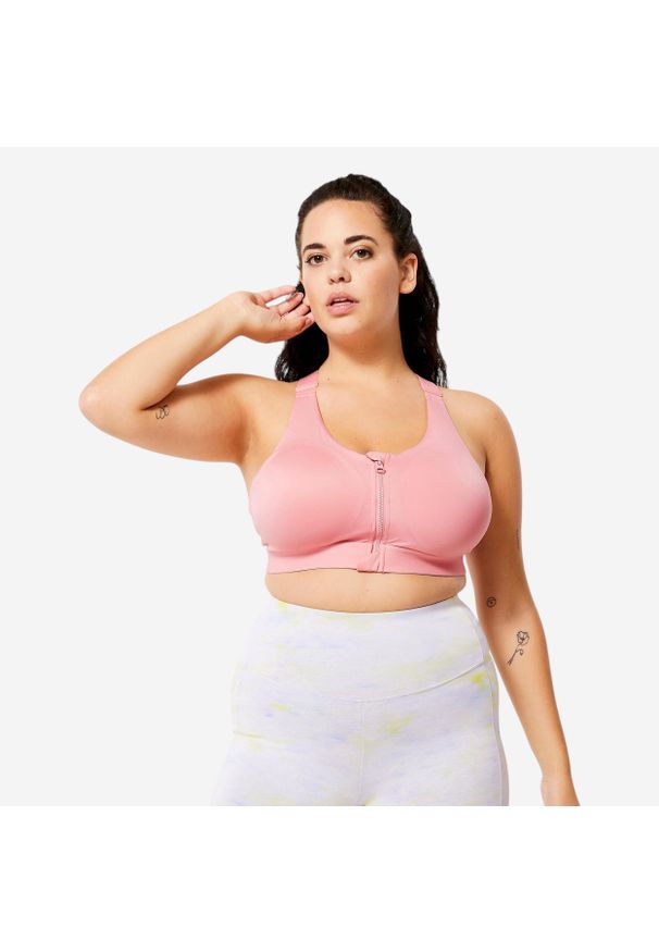 DOMYOS - Stanik sportowy Domyos. Kolekcja: plus size. Kolor: różowy. Materiał: materiał, elastan, skóra. Długość rękawa: na ramiączkach. Sport: fitness