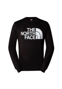 Bluza The North Face Standard 0A4M7WJK31 - czarna. Okazja: na co dzień. Typ kołnierza: bez kaptura. Kolor: czarny. Materiał: bawełna. Wzór: aplikacja. Styl: casual, klasyczny