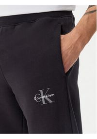 Calvin Klein Jeans Spodnie dresowe LV040BM802 Czarny Regular Fit. Kolor: czarny. Materiał: bawełna #5