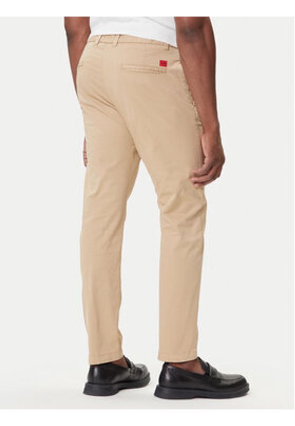 Hugo - HUGO Chinosy David251D 50530886 Beżowy Slim Fit. Kolor: beżowy. Materiał: bawełna