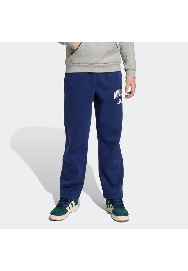 Adidas - Spodnie dziecięce ADIDAS. Kolor: niebieski. Materiał: materiał. Sport: joga i pilates