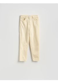 Reserved - Jeansy mom fit - żółty. Kolor: żółty