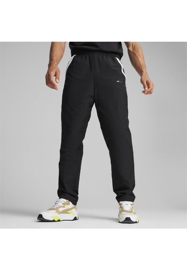 Spodnie dresowe tkane Puma AMG. Kolor: czarny. Materiał: dresówka