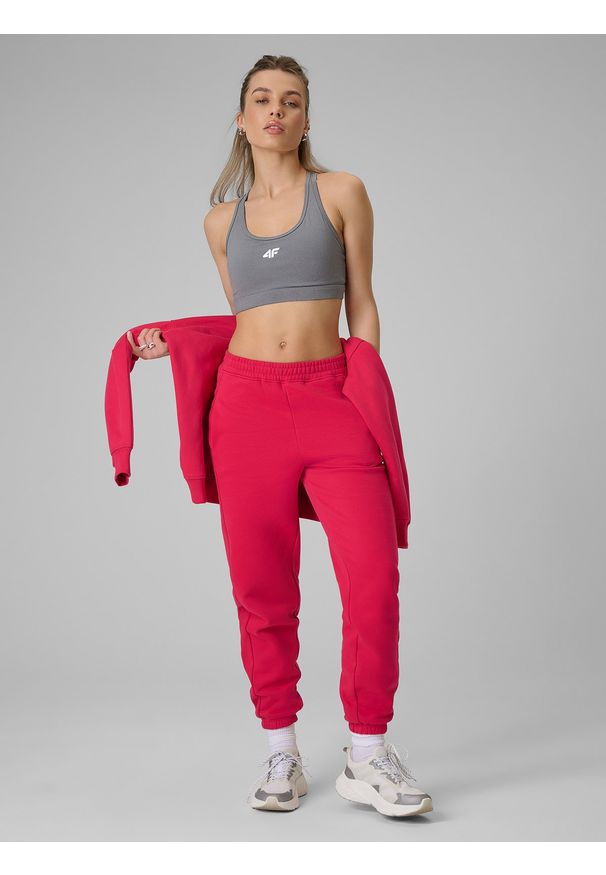 4f - 4F Spodnie dresowe joggery damskie - czerwone XL. Kolor: czerwony. Materiał: dresówka