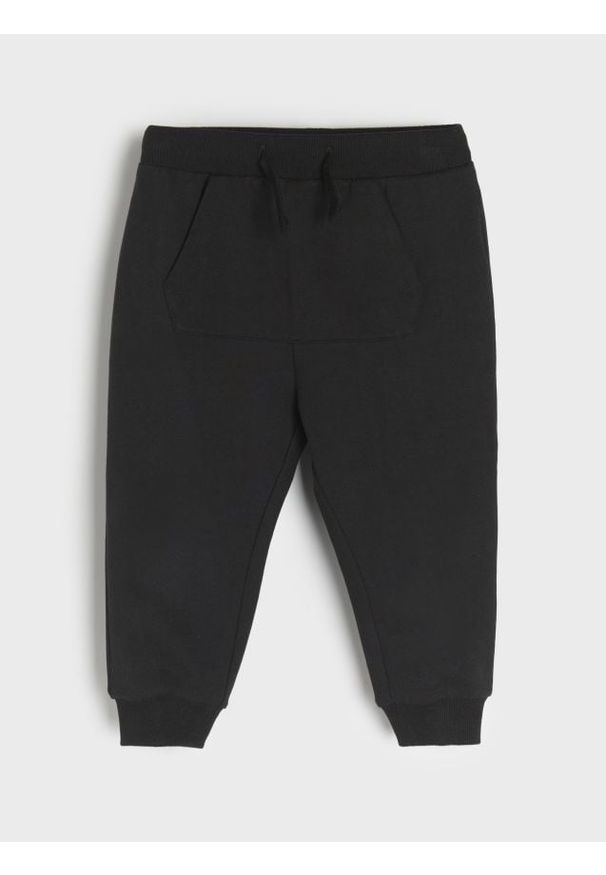 Sinsay - Bawełniane spodnie jogger - czarny. Kolor: czarny. Materiał: bawełna. Długość: długie