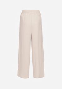 Renee - Beżowe Szerokie Spodnie z Wiskozą z Gumką w Pasie Lealirre. Okazja: na co dzień. Kolor: beżowy. Materiał: wiskoza. Wzór: gładki. Styl: casual #4