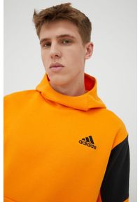 adidas Performance bluza HE9819 męska kolor pomarańczowy z kapturem z nadrukiem. Typ kołnierza: kaptur. Kolor: pomarańczowy. Materiał: bawełna, poliester. Wzór: nadruk #2