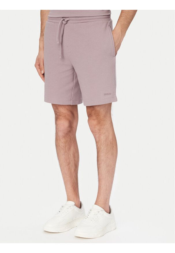 Hugo - HUGO Szorty sportowe Austin 50532023 Różowy jasny Regular Fit. Kolor: różowy. Materiał: syntetyk. Styl: sportowy