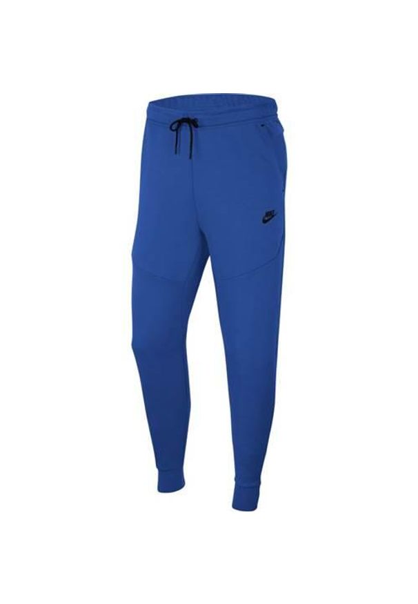 Spodnie sportowe męskie Nike Tech Fleece. Kolor: niebieski. Materiał: dresówka