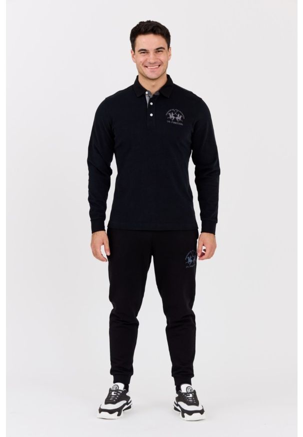 La Martina - LA MARTINA Czarny męski longsleeve polo HEAVY JERSEY. Typ kołnierza: polo. Kolor: czarny. Materiał: jersey. Długość rękawa: długi rękaw. Długość: długie. Styl: klasyczny