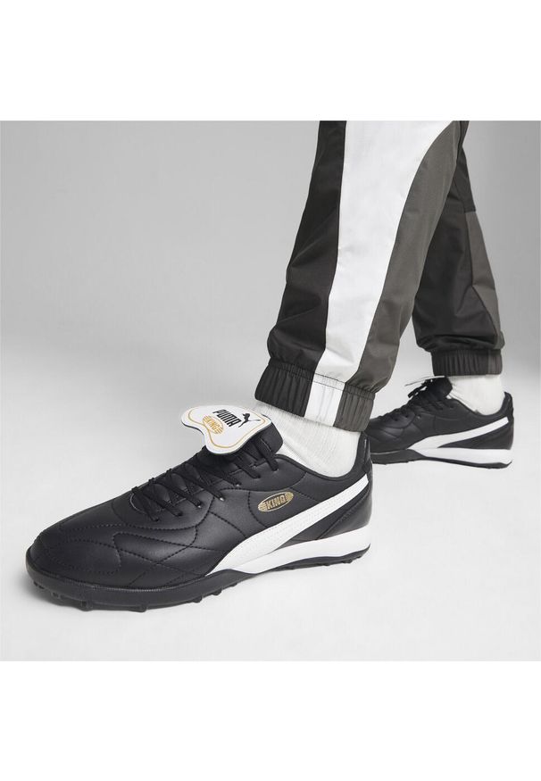 Buty piłkarskie męskie Puma King Top Tt. Kolor: żółty, biały, wielokolorowy, czarny. Materiał: materiał, syntetyk. Szerokość cholewki: normalna. Sport: piłka nożna